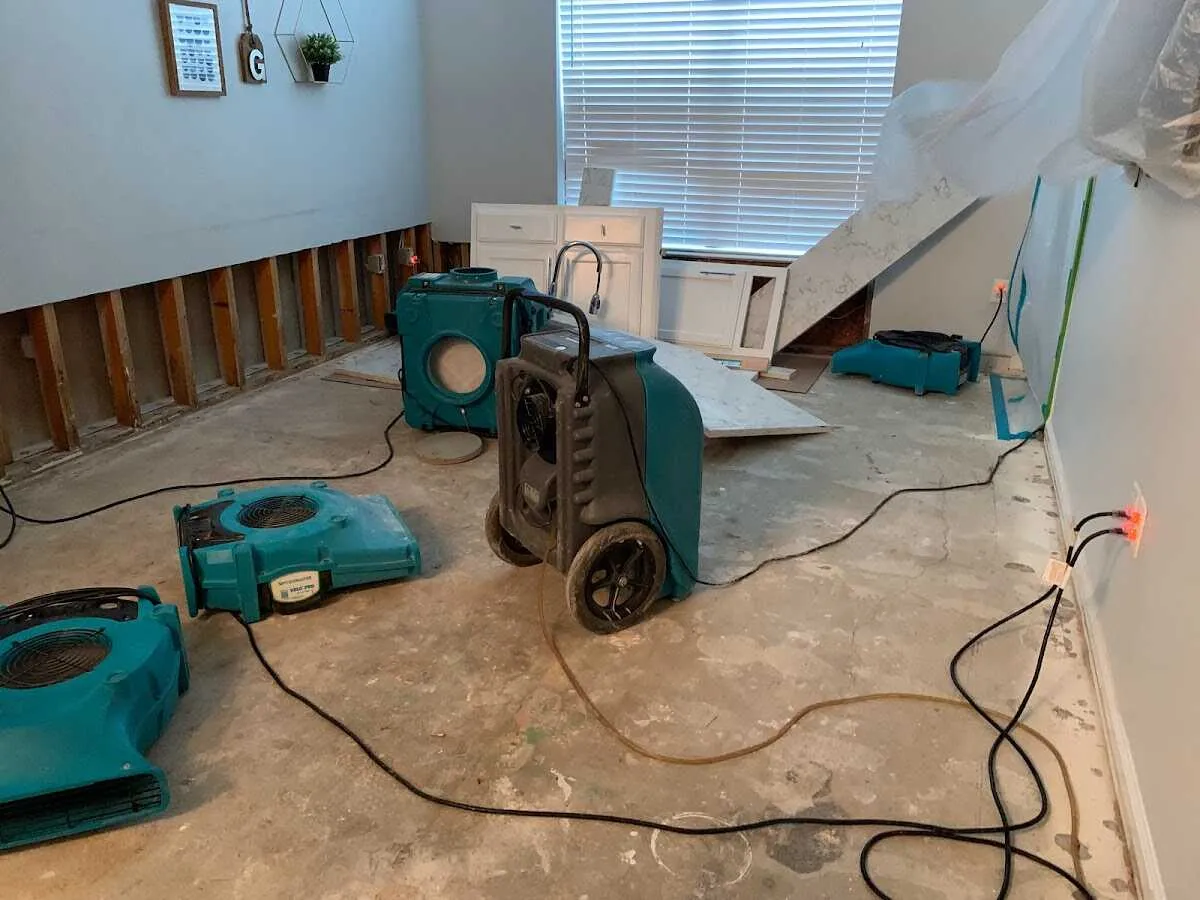 Dehumidifier in flood-cut room for Water Damage Restoration in Massillon
